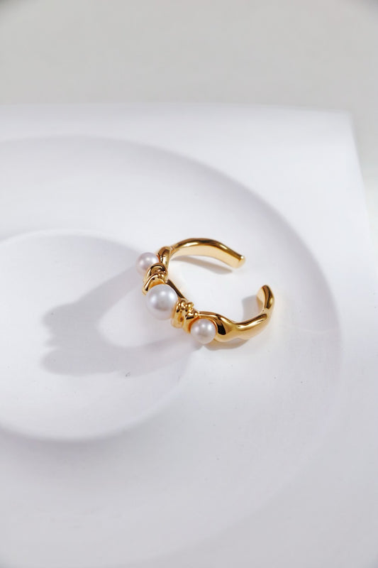 Bague ouverte en argent 925 fondue avec perle naturelle