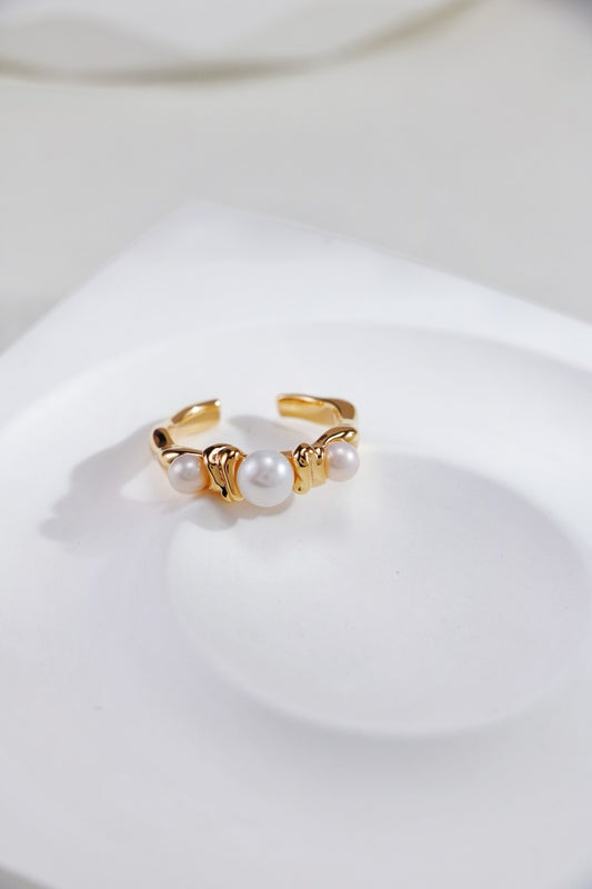 Bague ouverte en argent 925 fondue avec perle naturelle